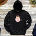 a black hoodie with a cat on it