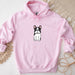 a pink hoodie with a black and white dog on it