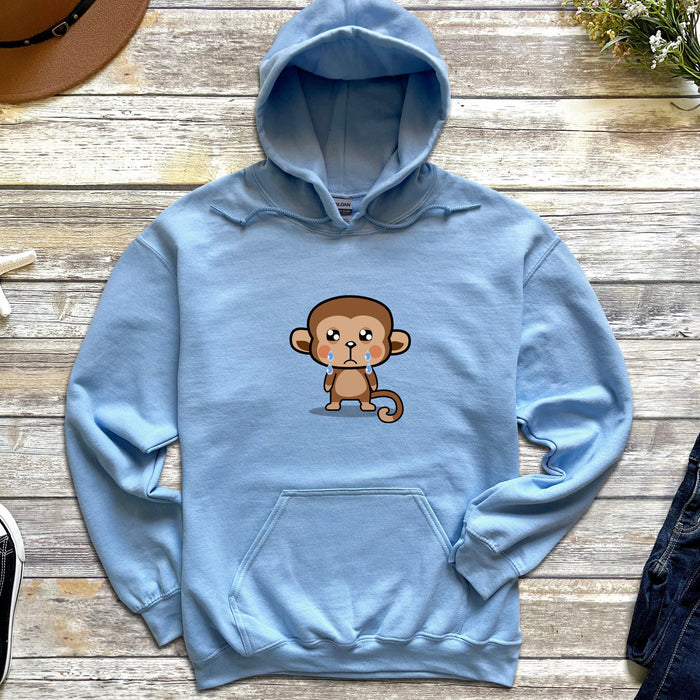 a blue hoodie with a cartoon monkey on it