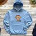 a blue hoodie with a cartoon monkey on it