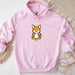 a pink hoodie with a cartoon fox on it