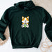 a green hoodie with a picture of a cat on it
