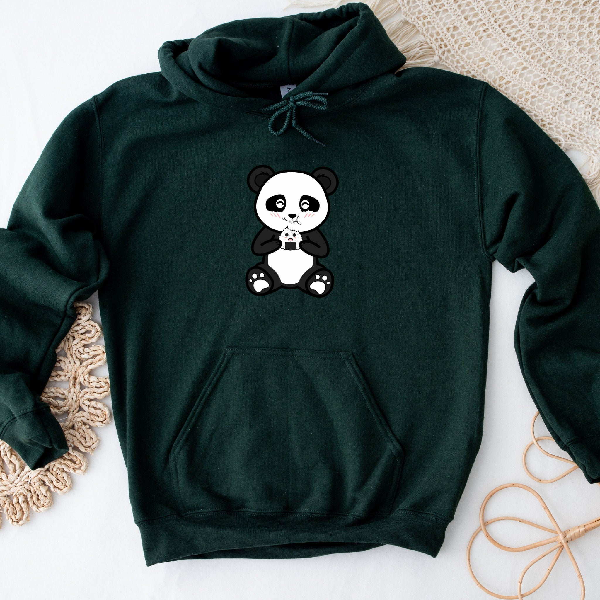 a green hoodie with a panda bear on it