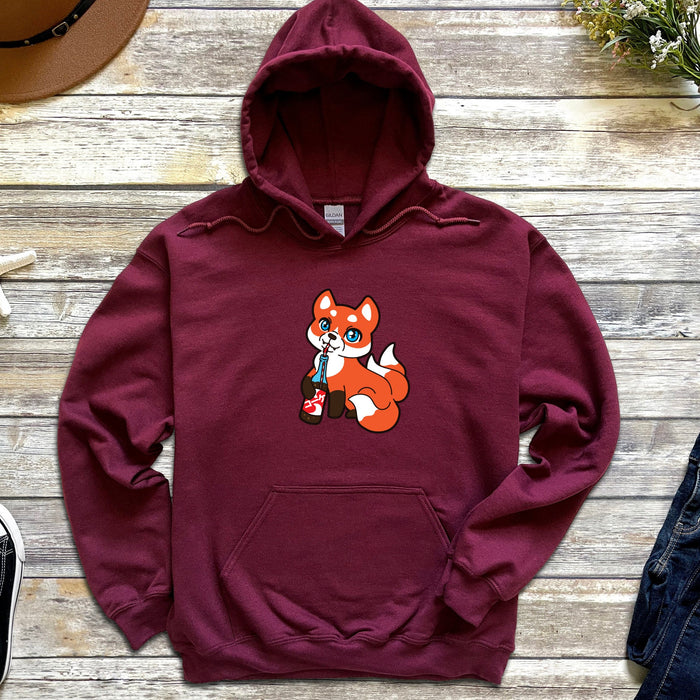 a red hoodie with a cartoon fox on it