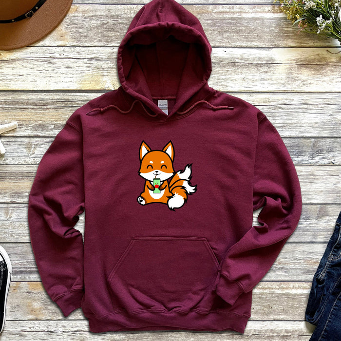 a red hoodie with a cartoon fox on it