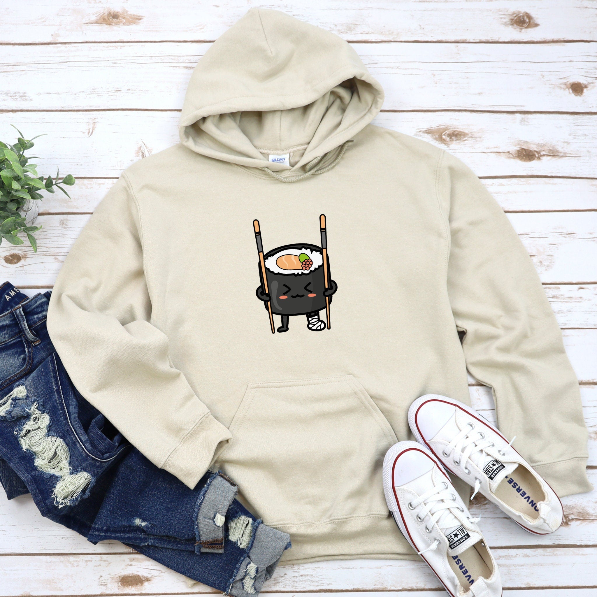 a hoodie with a picture of a sushi on it