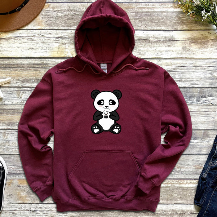 a red hoodie with a panda bear on it