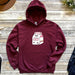 a maroon hoodie with an image of a food truck on it