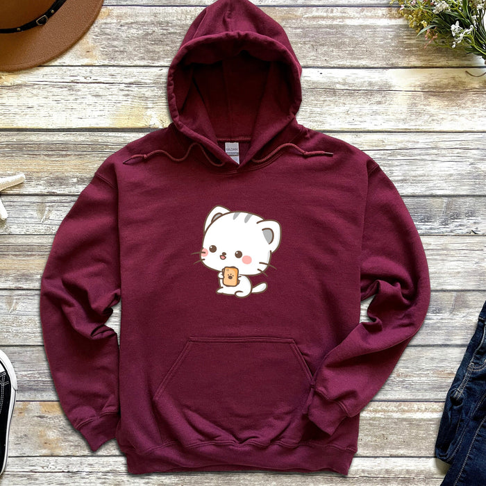 a red hoodie with a white cat on it