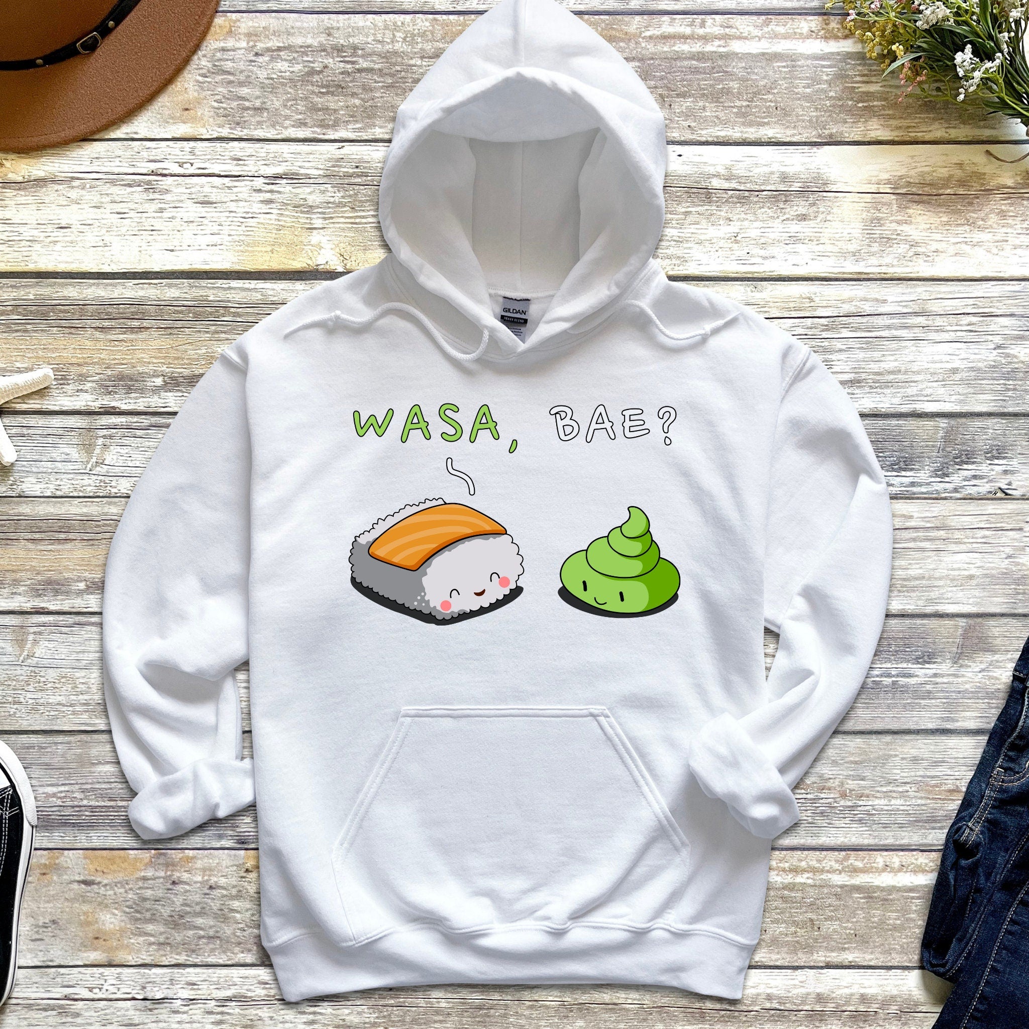 a white hoodie with sushi on it
