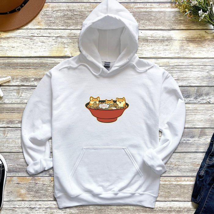 a white hoodie with three cats in a bowl on it