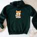 a green hoodie with a picture of a fox on it