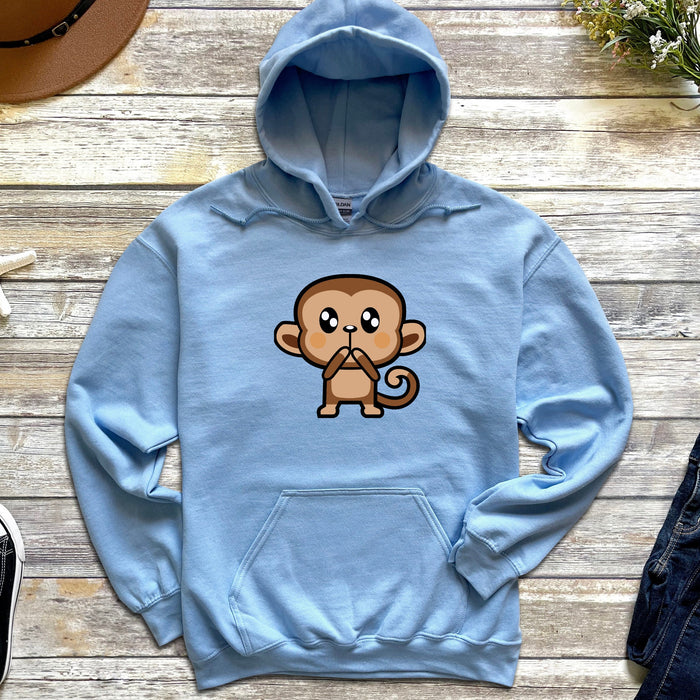 a blue hoodie with a cartoon monkey on it
