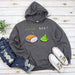 a sweatshirt with sushi on it and a pair of jeans