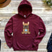 a red hoodie with a cartoon dog on it