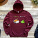 a red sweatshirt with a sushi on it