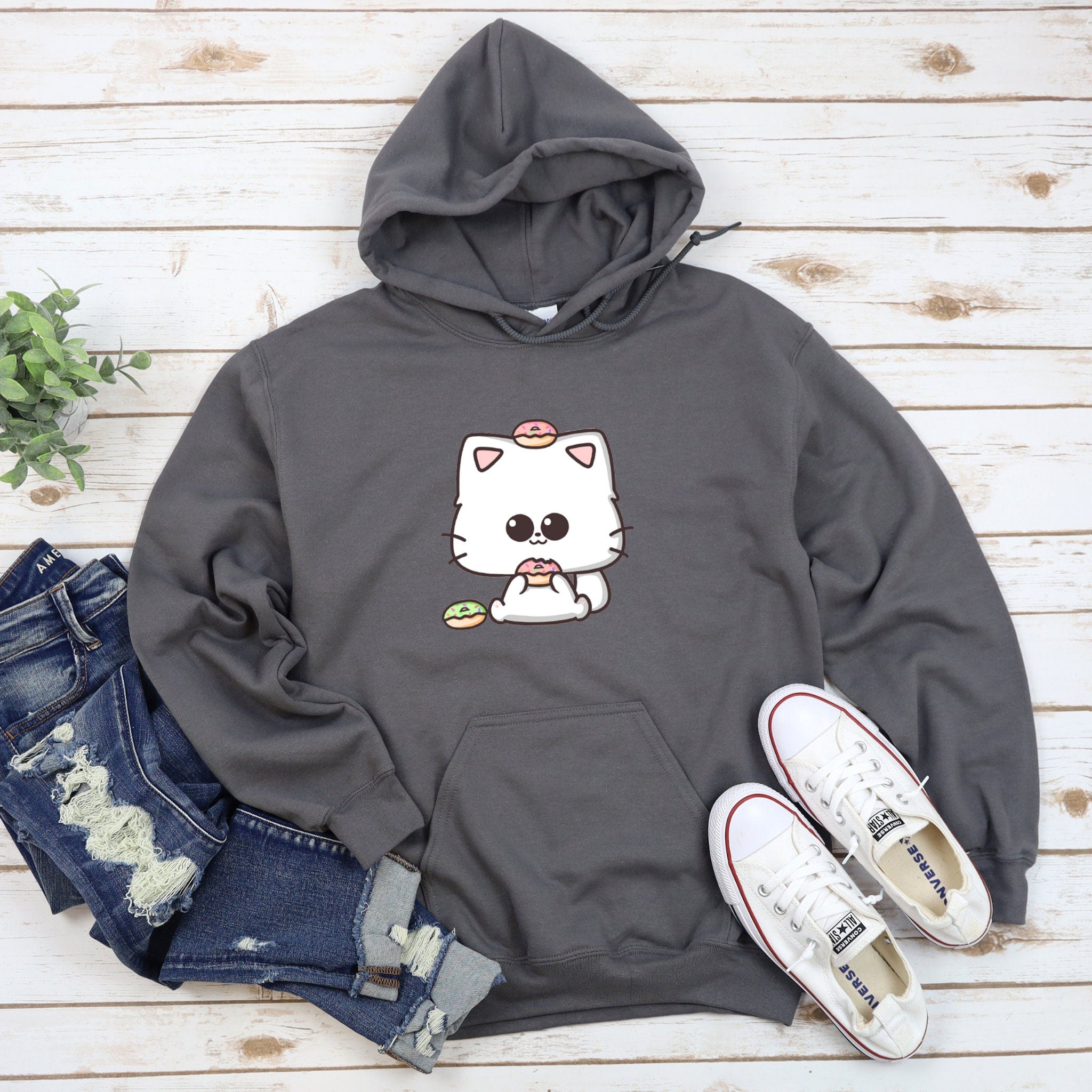 a gray hoodie with a white cat on it
