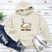 a white sweatshirt with a cartoon character on it