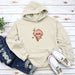 a hoodie with a picture of an apple on it