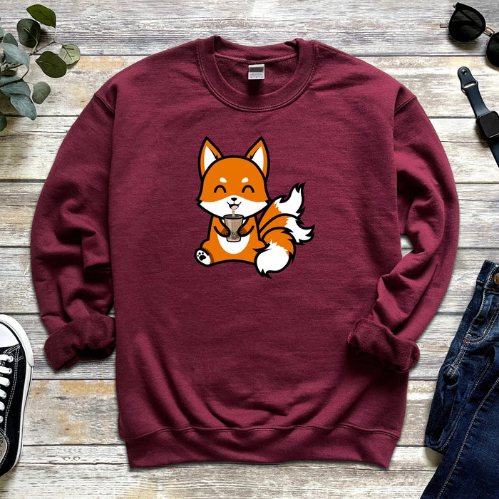 a red sweatshirt with a picture of a fox on it